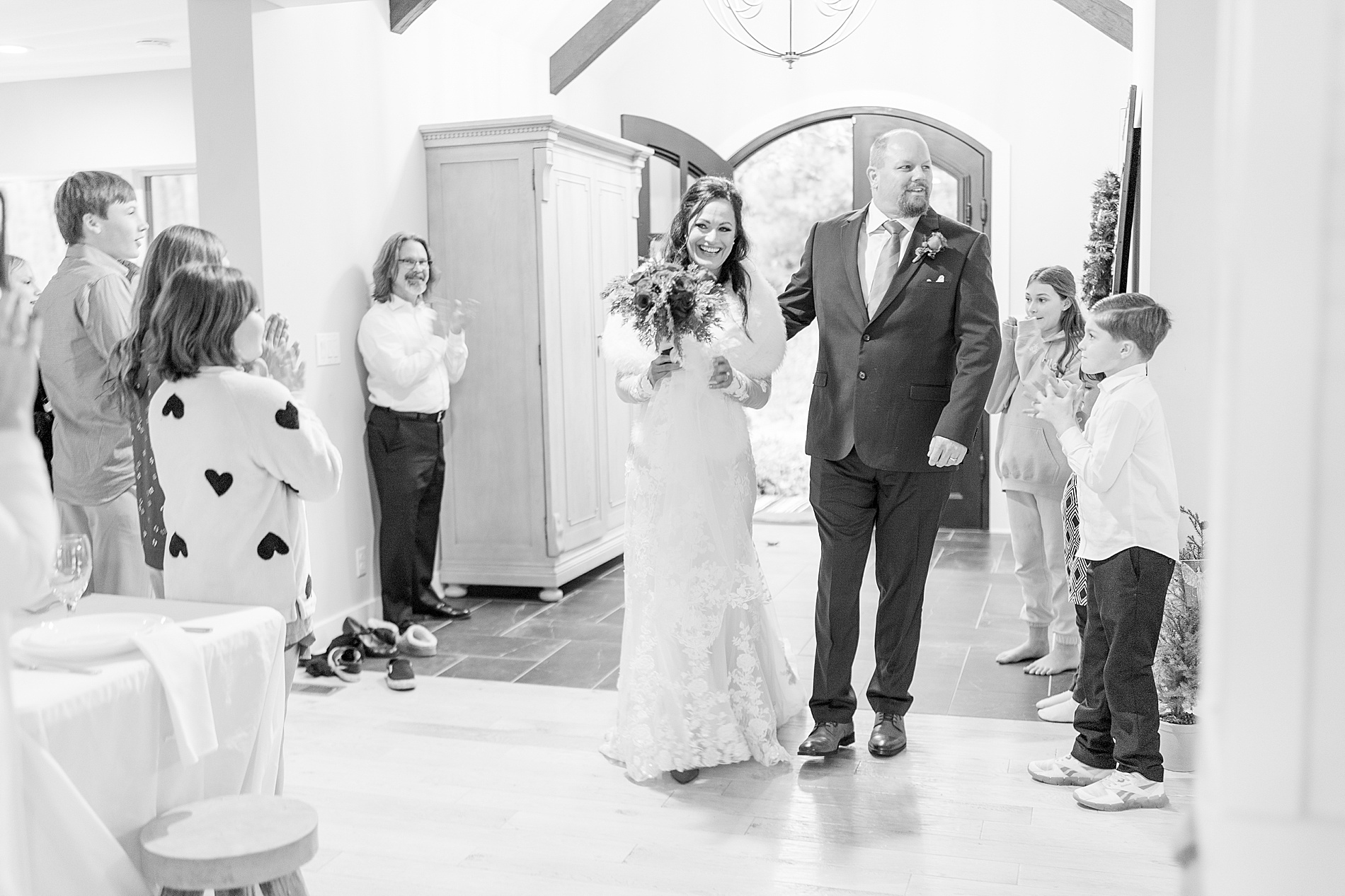 newlyweds enter airbnb reception 