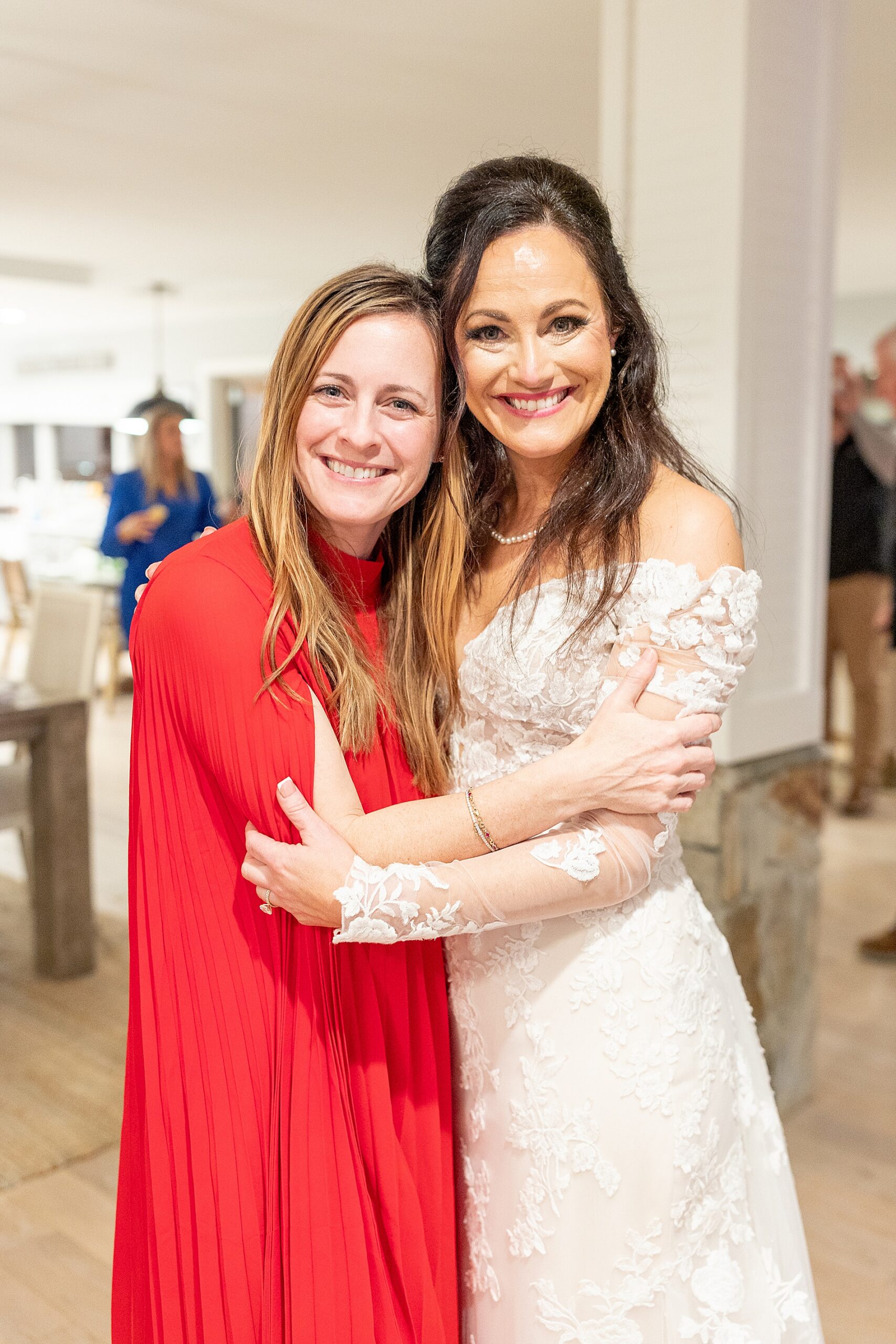 bride hugs friend 