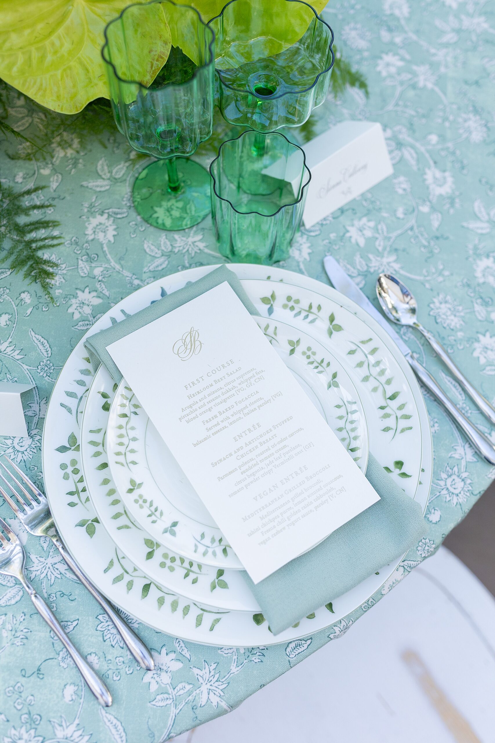 menus on plates at table from reception 