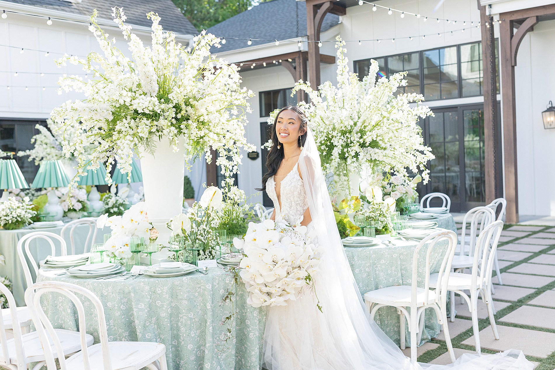 bride at outdoor reception on patio of The Bradford 