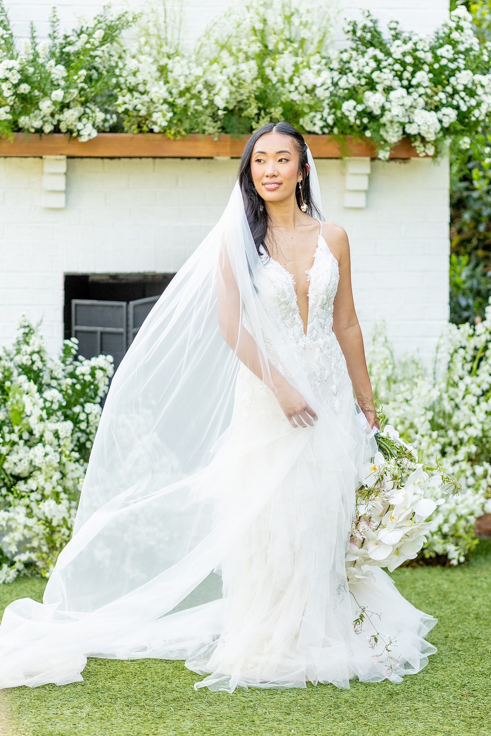 bride by white florals 