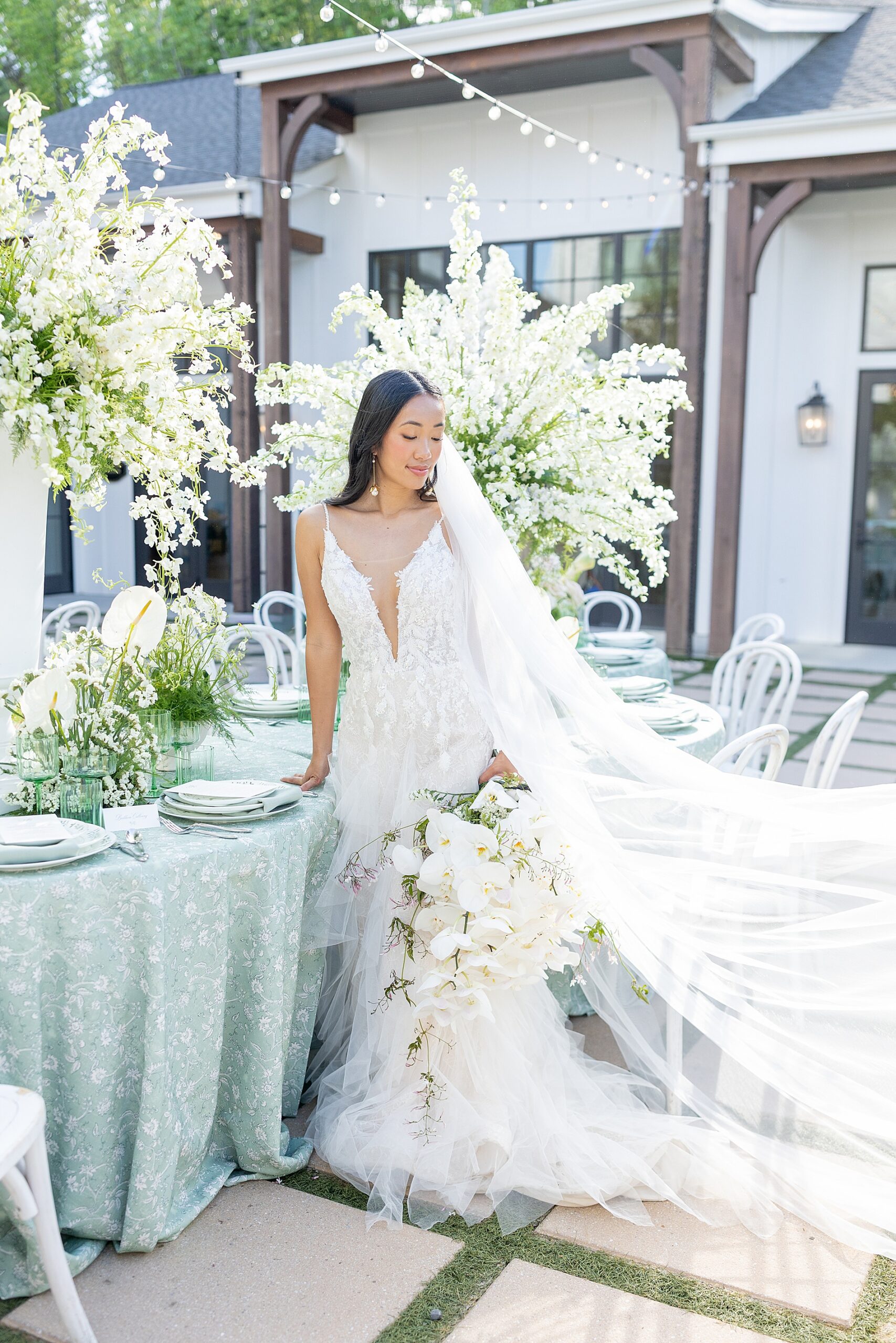 bride siting at reception table